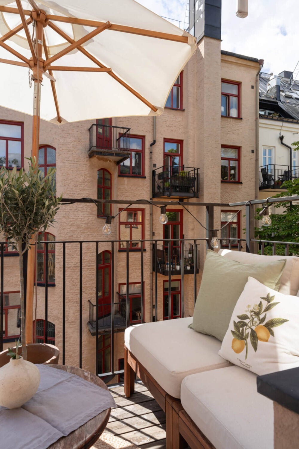 A Calm, Neutral Color Palette in a Classic Swedish Apartment 14 sunny courtyard balcony