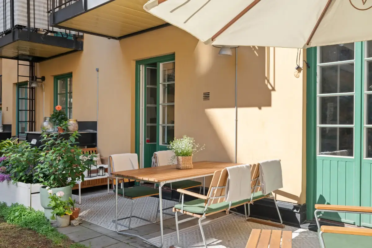 A Charming Ground Floor Family Apartment in Stockholm 8 terrace dining table