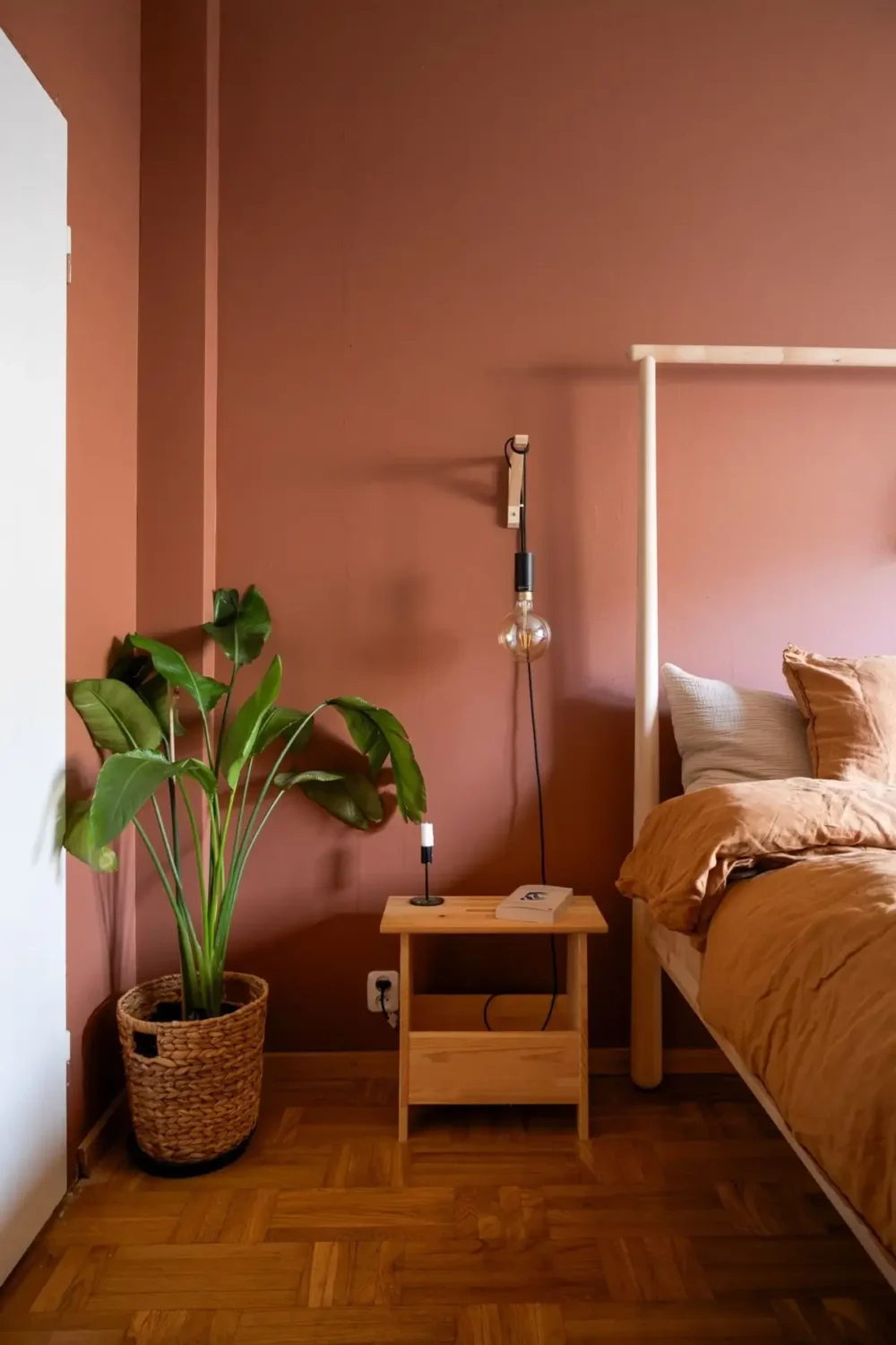 A Swedish Apartment with a Dutch Parquet Floor and Terracotta Bedroom 13 terracotta pink bedroom dutch parquet floor