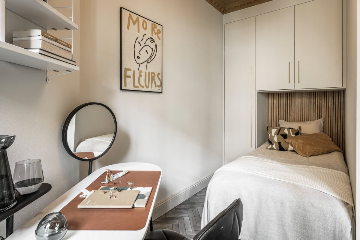 A Swedish Apartment with Exclusive Materials and Monochrome Color Scheme 12 tiny bedroom with wardrobes and desk