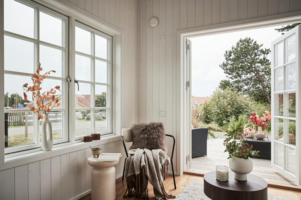 A Charming Tiny House in Sweden with a Private Terrace 3 tiny house glass doors to terrace