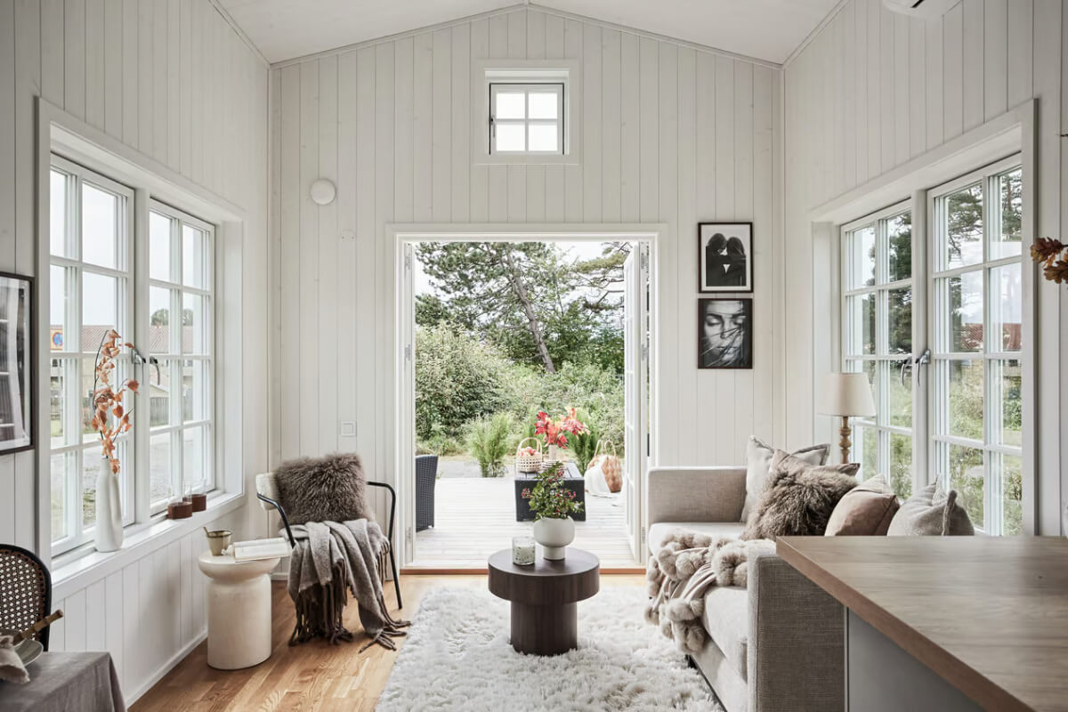 A Charming Tiny House in Sweden with a Private Terrace 2 tiny house white cladded interiors
