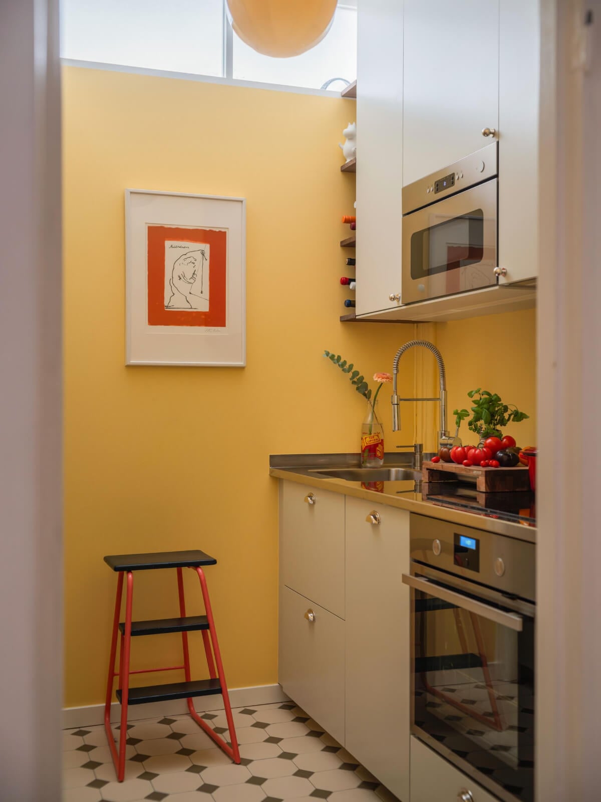tiny kitchen light gray cabinets yellow walls