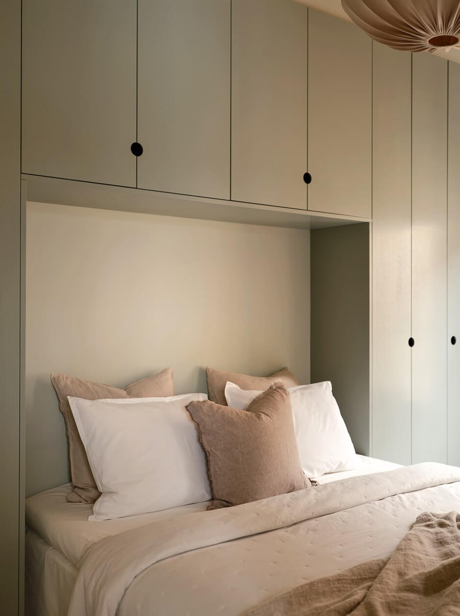A Small Modern Stockholm Apartment with Smart Storage Solutions 10 tiny scandi bedroom wardrobes around bed