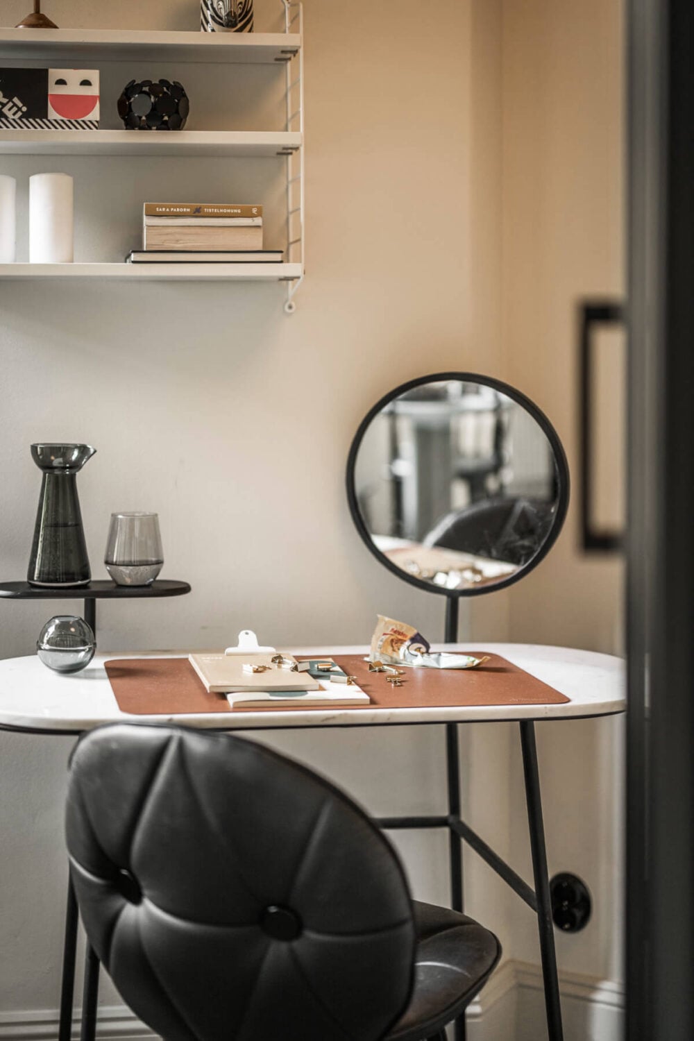 A Swedish Apartment with Exclusive Materials and Monochrome Color Scheme 13 vanity table with mirror
