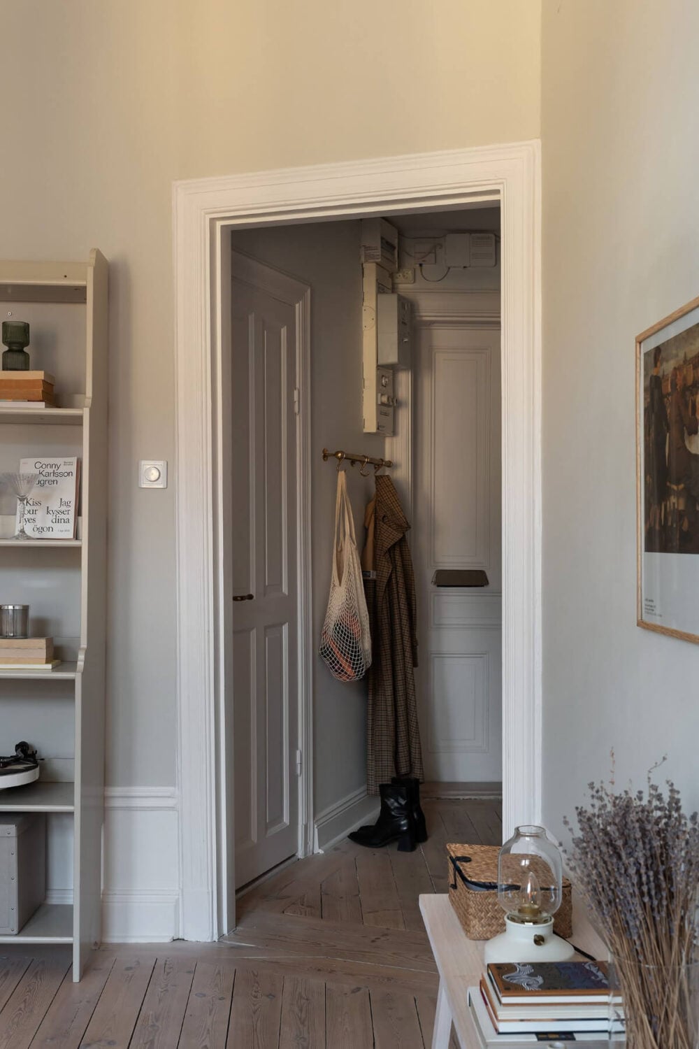A Small Light Gray Apartment with Period Features 18 view into hall