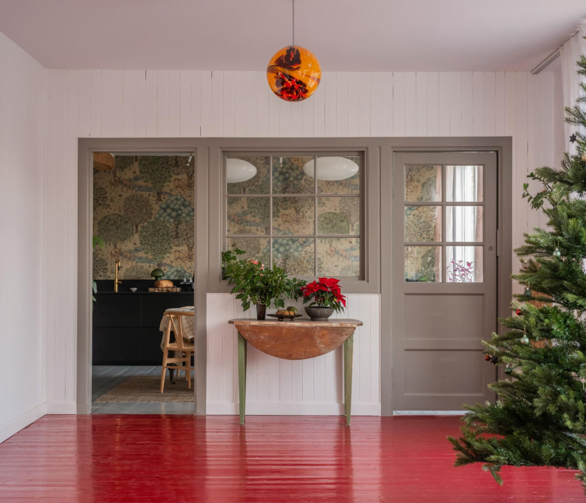 A Colored Sixth Wall May Be The Biggest Paint Trend in 2026 17 view into kitchen