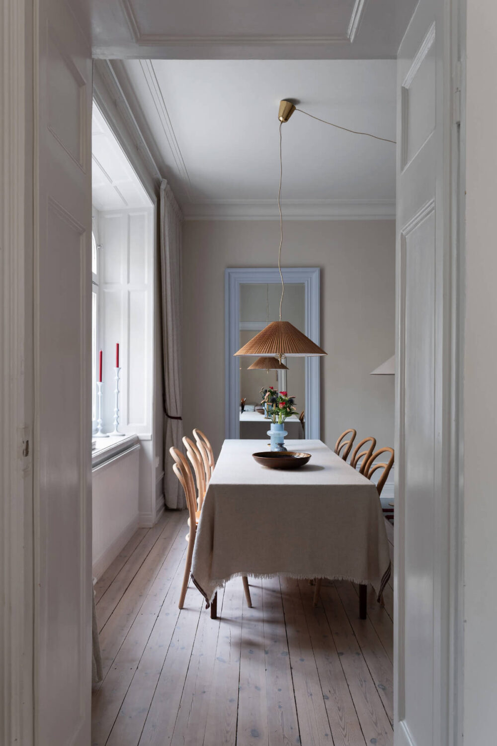 Contrasting Colors in a Turn-of-the-Century Apartment in Stockholm 6 view into living room 2 Contrasting Colors in a Turn-of-the-Century Apartment in Stockholm