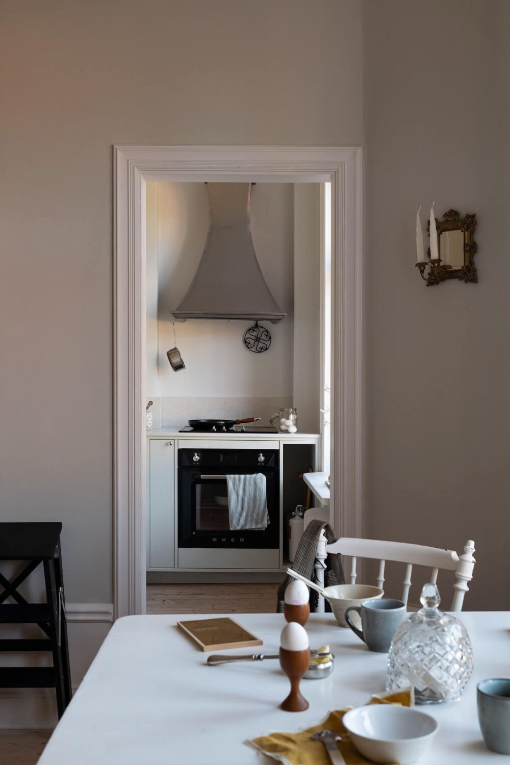 A Small Light Gray Apartment with Period Features 14 view into tiny kitchen