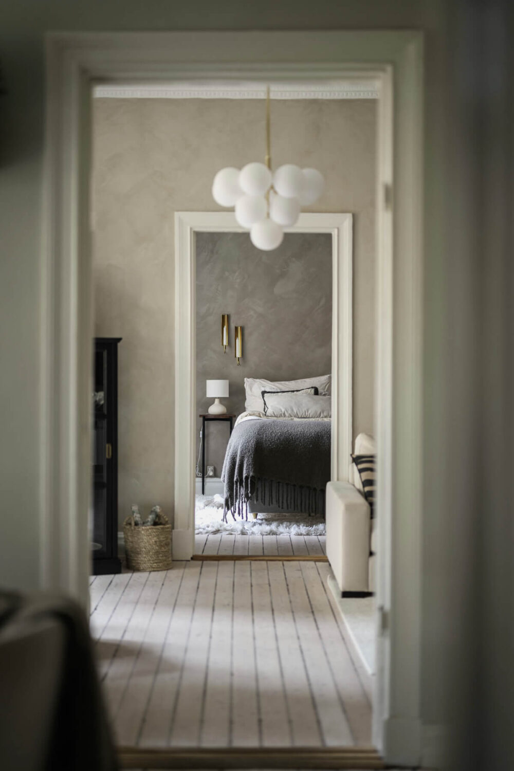Limewash Wall and Period Features in a Swedish Apartment 14 view to bedroom