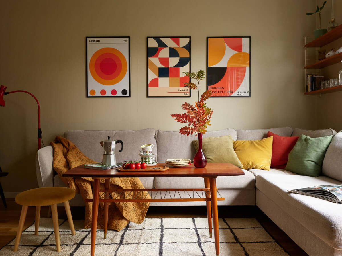 A Charming Midcentury Apartment with Original Features 2 warm living room corner sofa