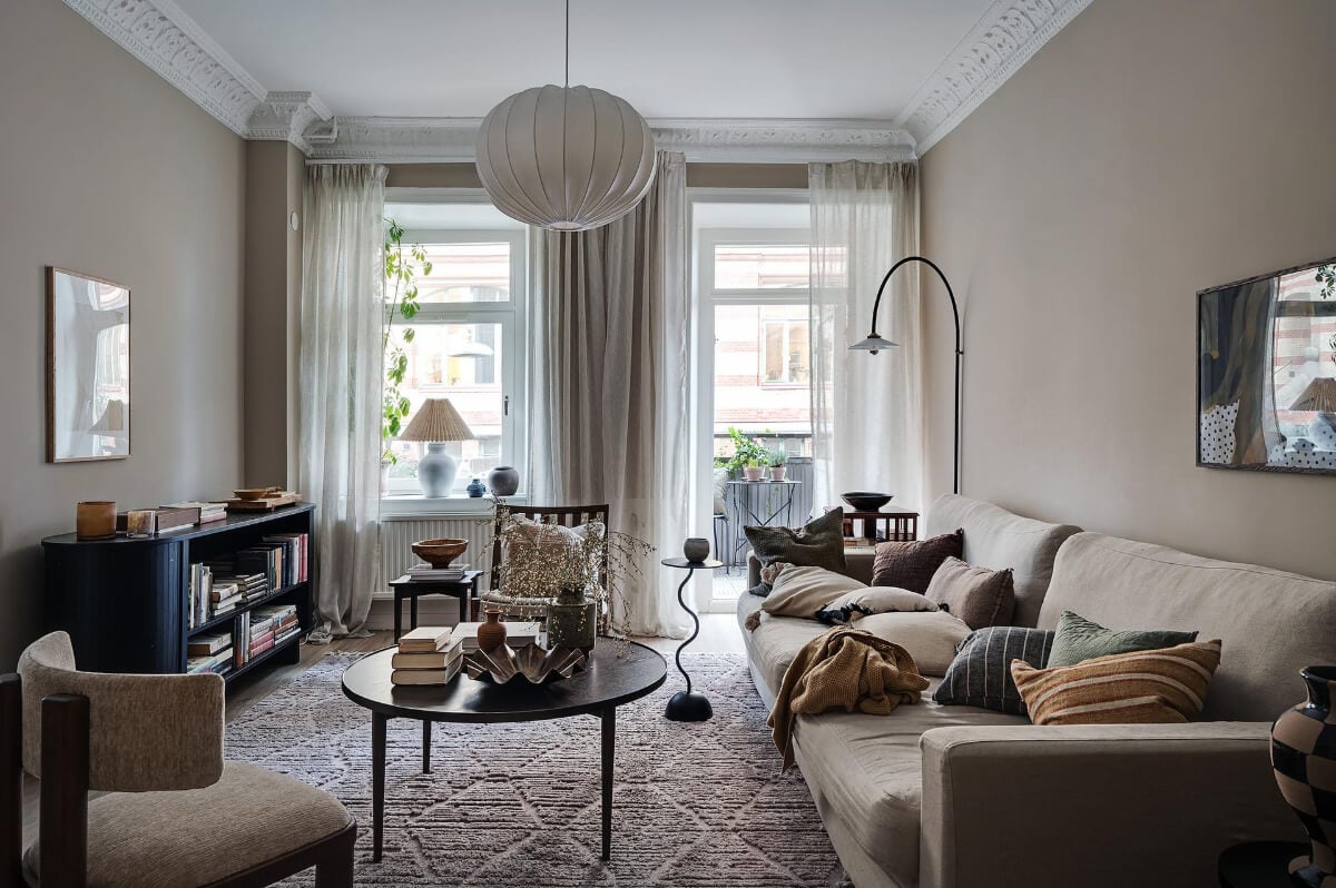 Warm and Inviting Rooms in a Renovated Swedish Apartment 3 warm scandinavian living room