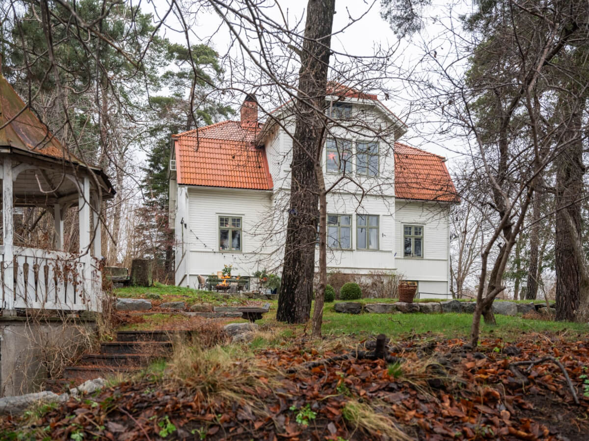 A Beautiful Turn-of-the-Century Family Home in Sweden 52 white swedish house surrounded by trees