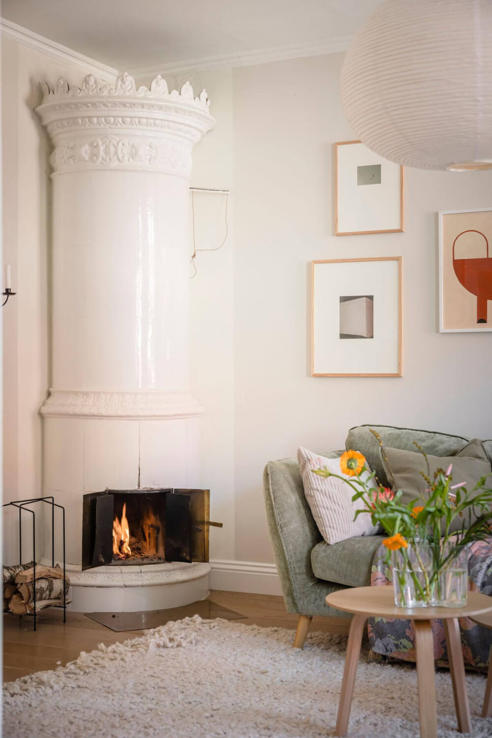 Bright Rooms with Light Color Tones in a Swedish Apartment 8 white tiled fireplace