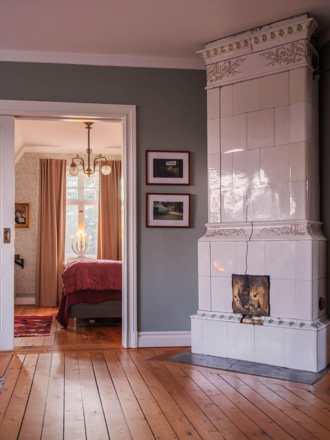 A Beautiful Turn-of-the-Century Family Home in Sweden 34 white tiled fireplace