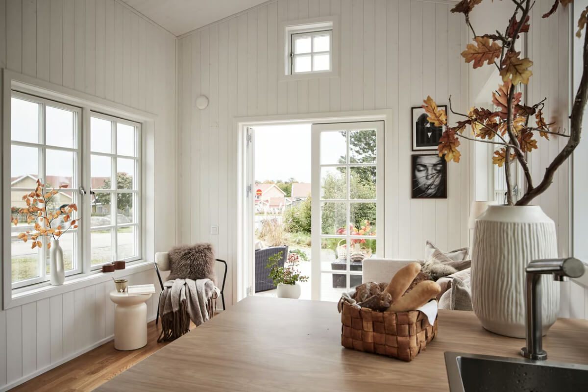 A Charming Tiny House in Sweden with a Private Terrace 10 white tiny house