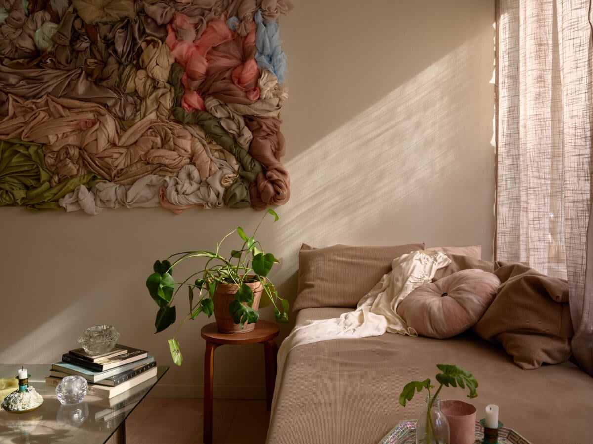 High Ceilings in a Small Swedish Loft Designed for a Family 11 window seat