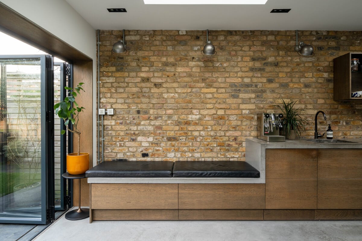 A Restored Victorian House with Exposed Brick and a Kitchen Extension 10 window seat brick wall