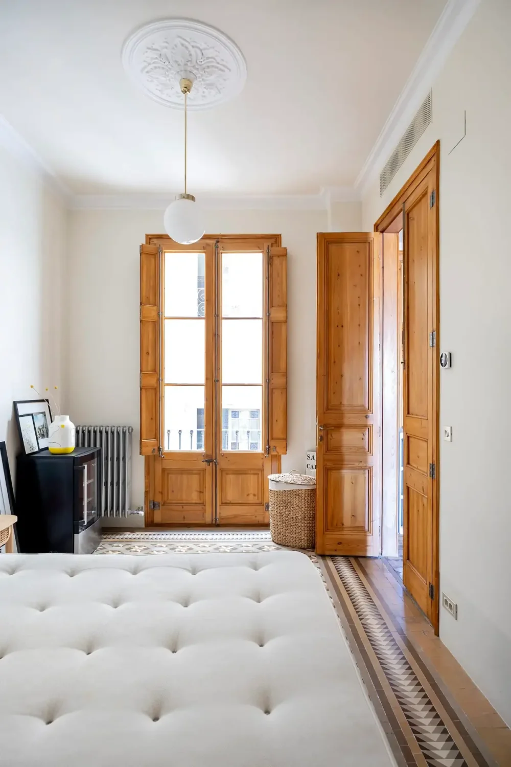 Historic Architecture and Modern Design in a Barcelona Apartment 11 wooden doors and shutters