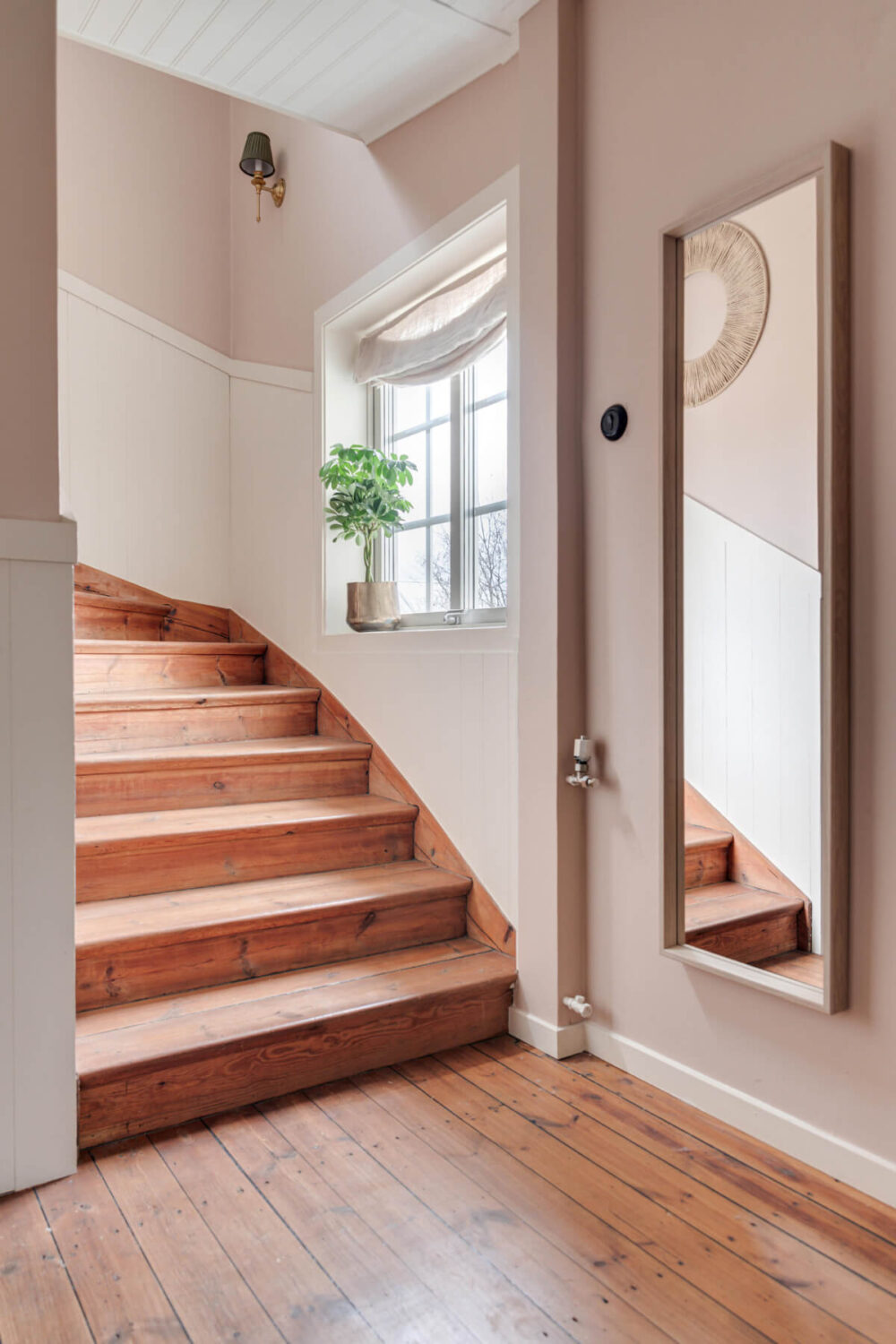 A Charming Home with Lake Views South of Stockholm 15 wooden staircase