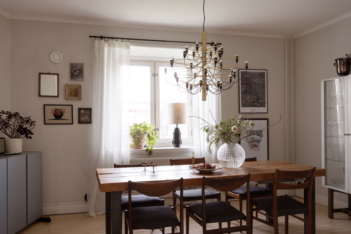 A Swedish Maisonette Apartment with Basement Bedrooms 10 wooden table black chairs
