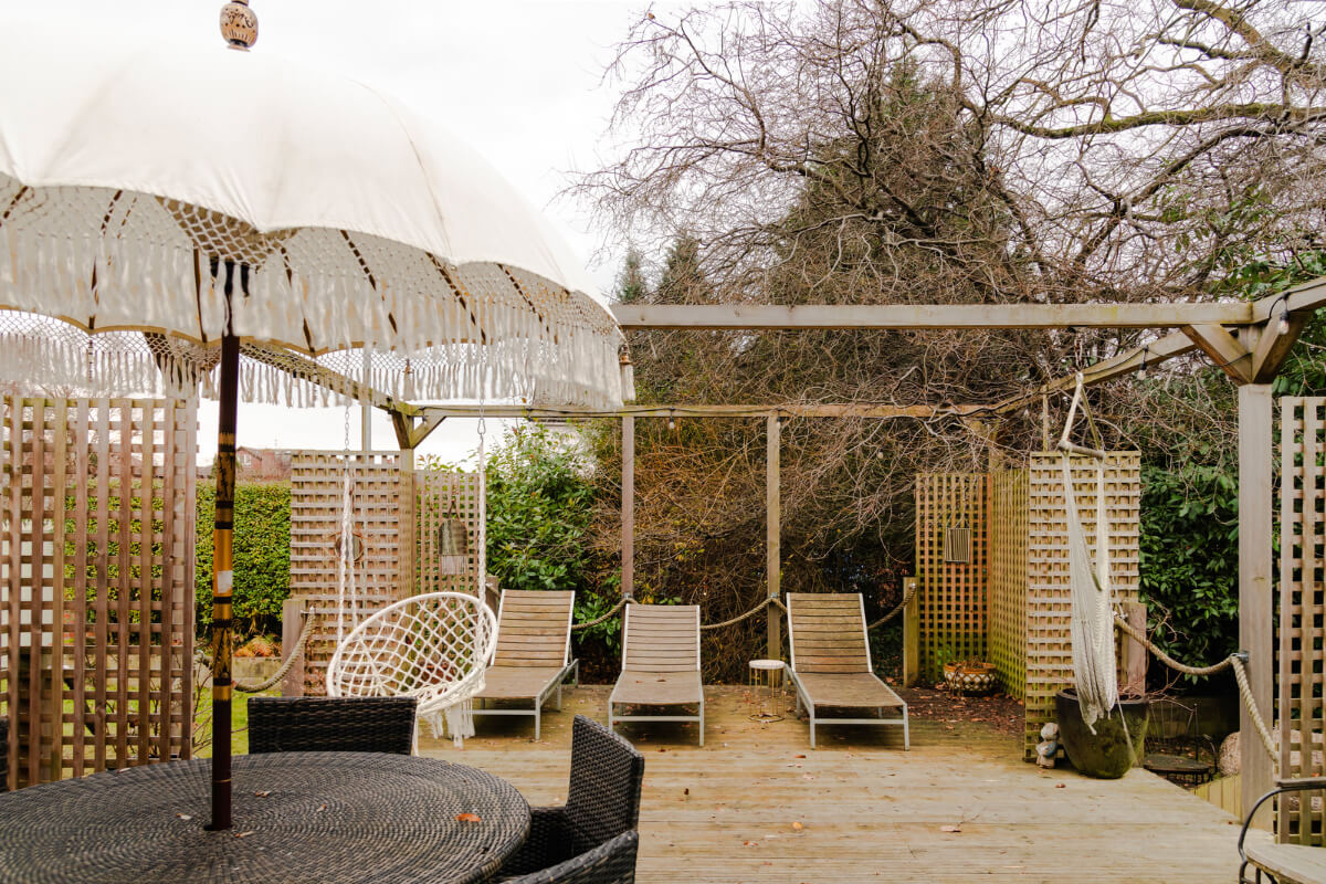 A Grand Victorian Villa in Manchester with Bold Interiors 37 wooden terrace