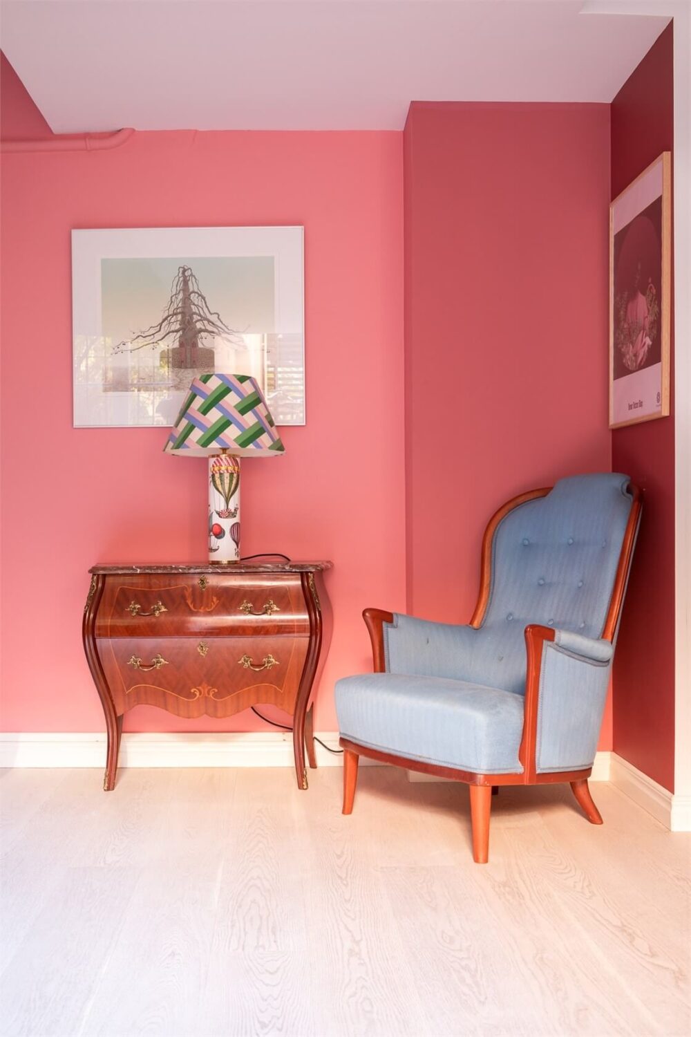 A Colorful Basement Duplex Apartment in Stockholm 4 antique cabinet coral pink wall