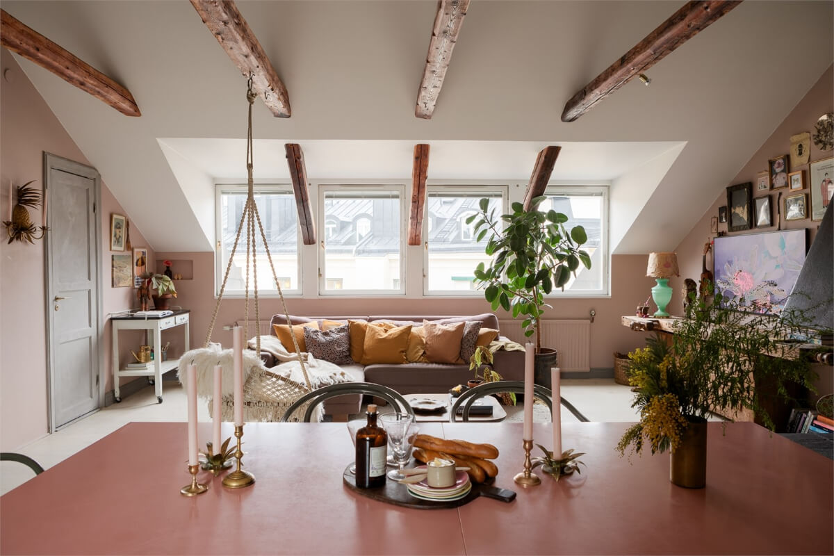 A Colorful Family Attic Apartment in Stockholm 11 attic living room wooden beams