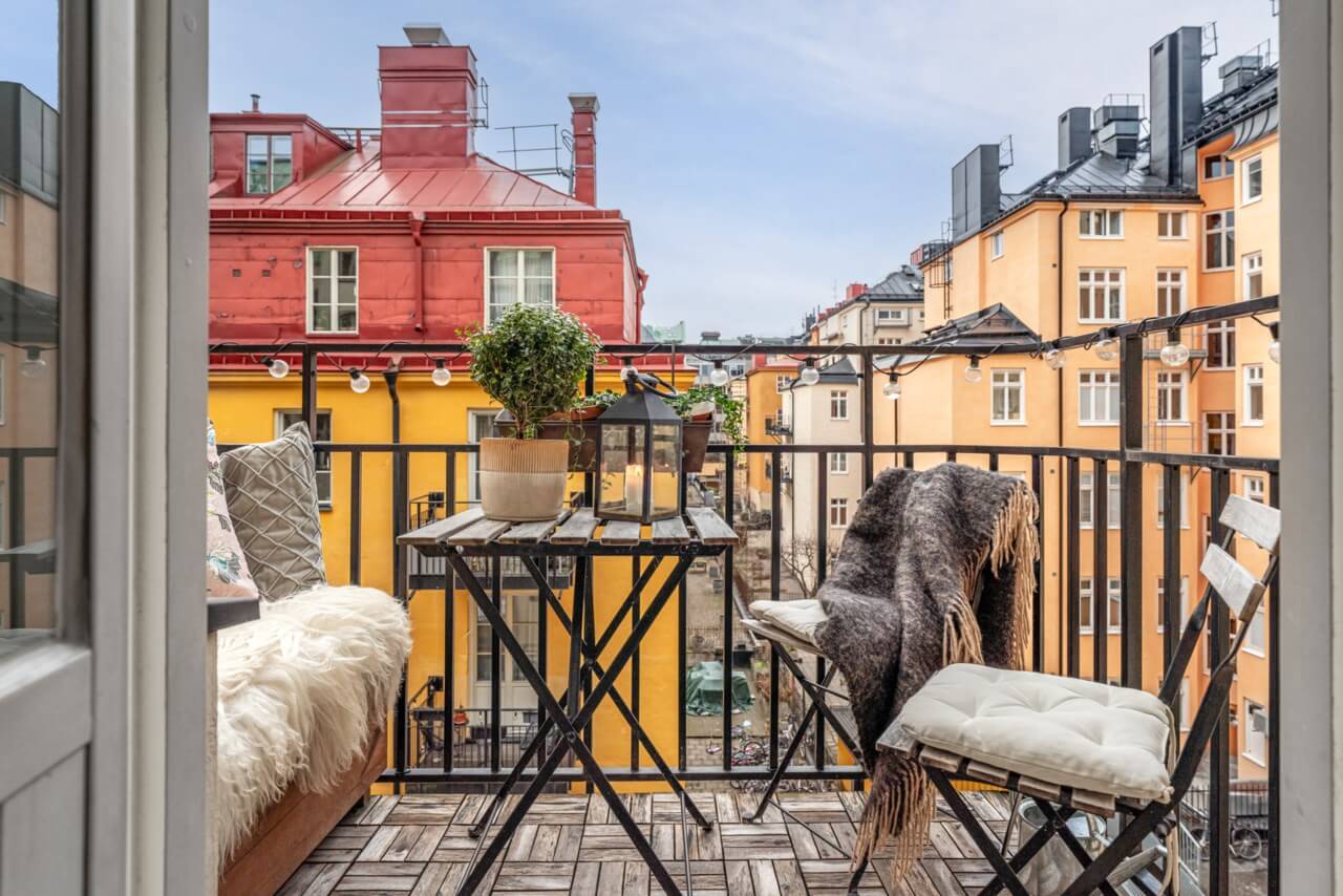 A Small Light-Filled Apartment with a Pink Bedroom 4 balcony