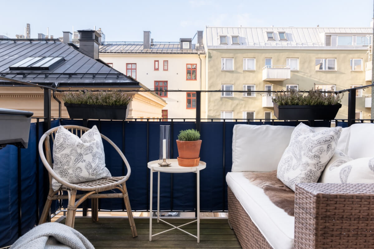 A Small Apartment Decorated in a Light Gray & White Color Palette 17 balcony