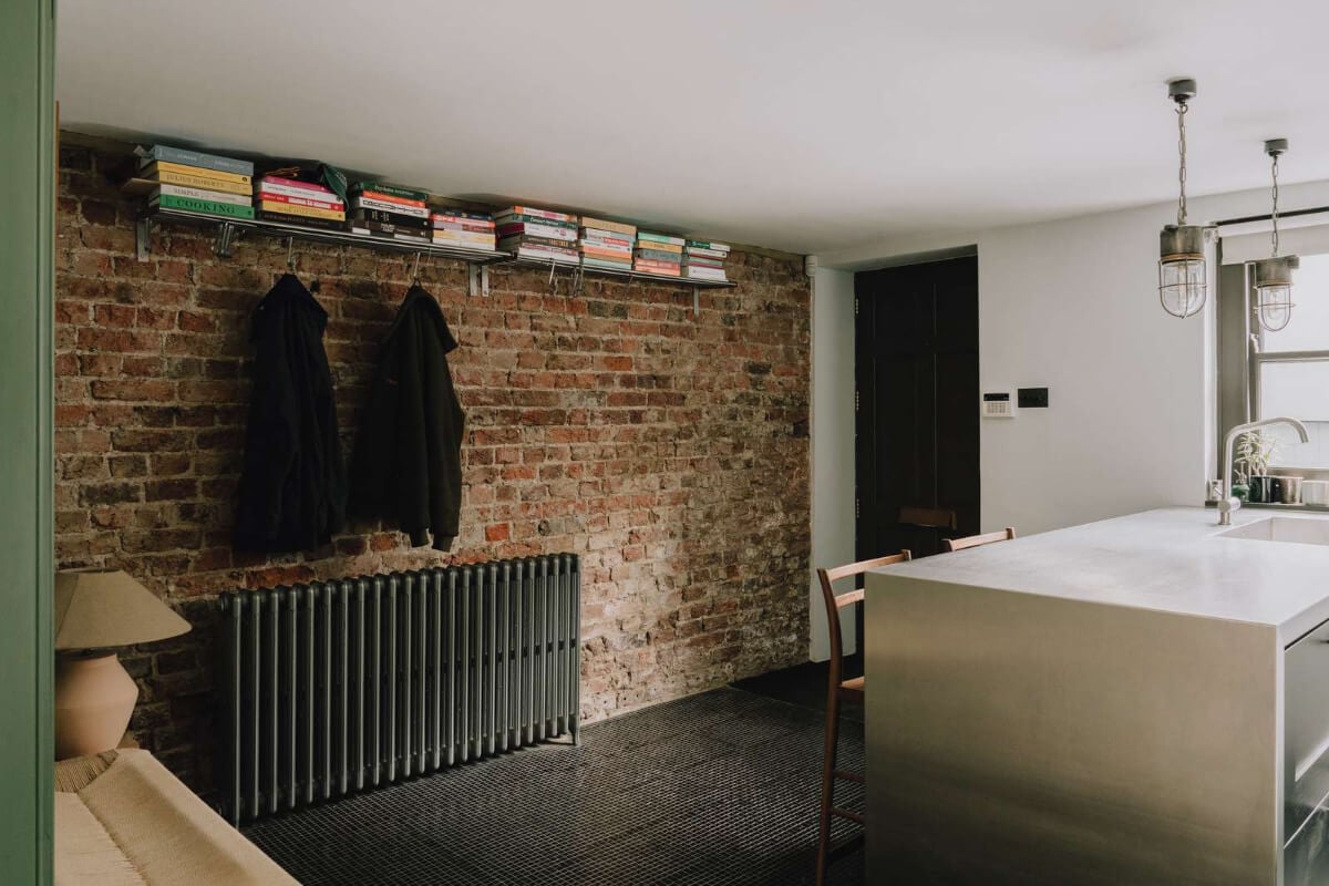 A London Basement Apartment in a Former Wood Workshop 13 basement kitchen exposed brick wall