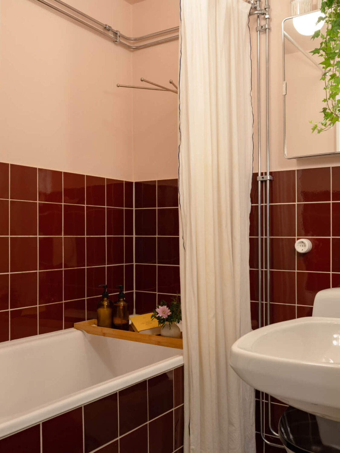 A Beautiful Well-Preserved 1930s Apartment with a Blue Kitchen 21 bathroom dark red tiles