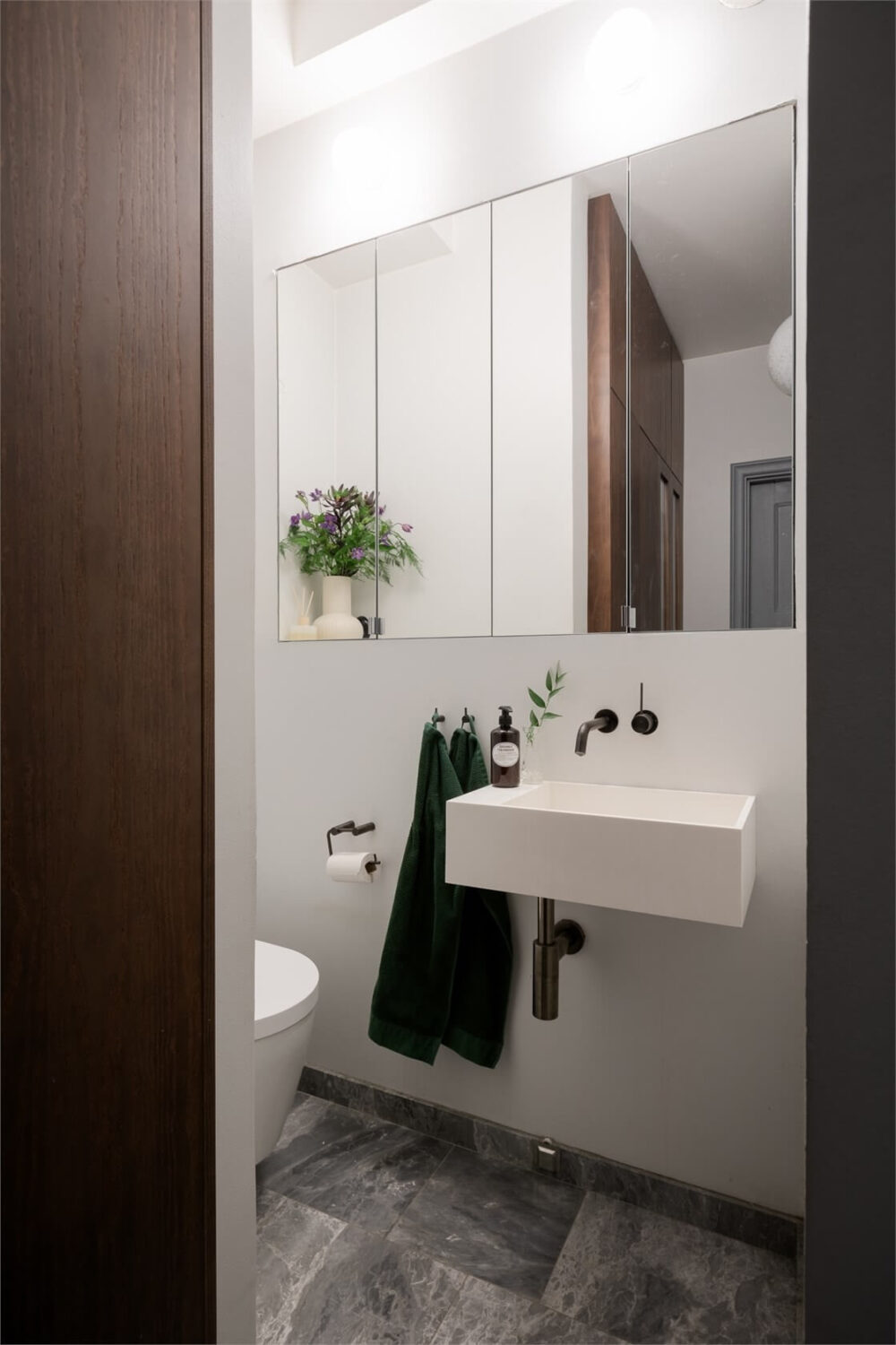 A Small Stockholm Apartment with a Blue Shaker Kitchen 22 bathroom large mirror