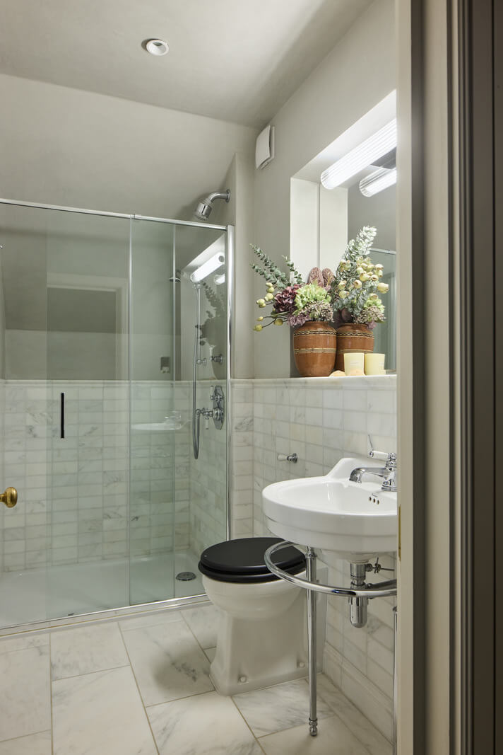 A Renovated Early Victorian Townhouse Decorated in Green Tones 18 bathroom marble tiles