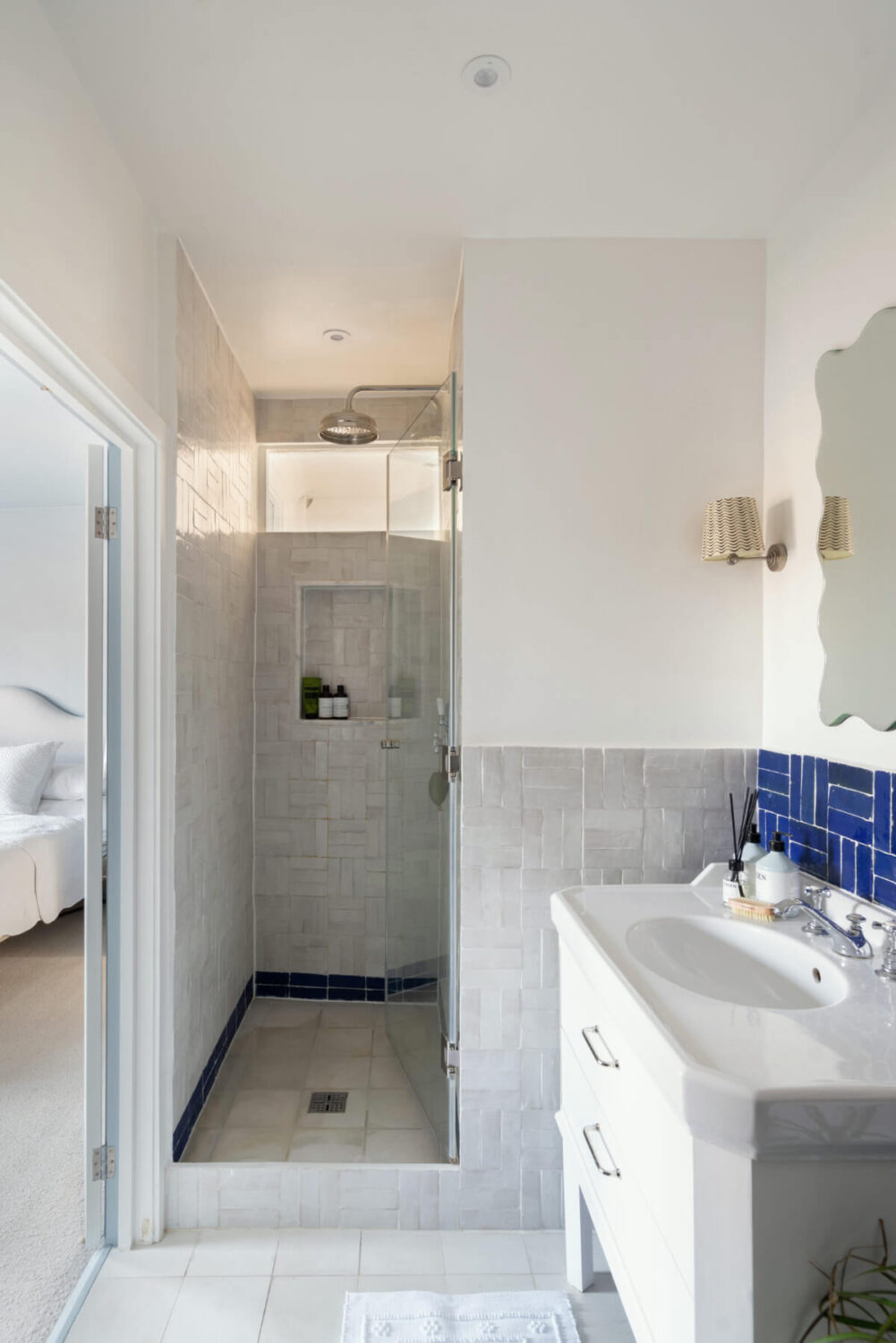 A Bright Victorian House with Plaster Walls and Blue Rooms 17 bathroom shower