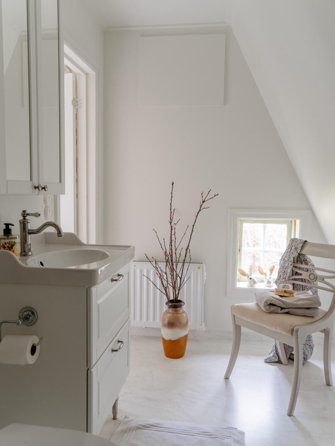 A Romantic Countryside Villa North of Stockholm 29 bathroom slanted ceiling