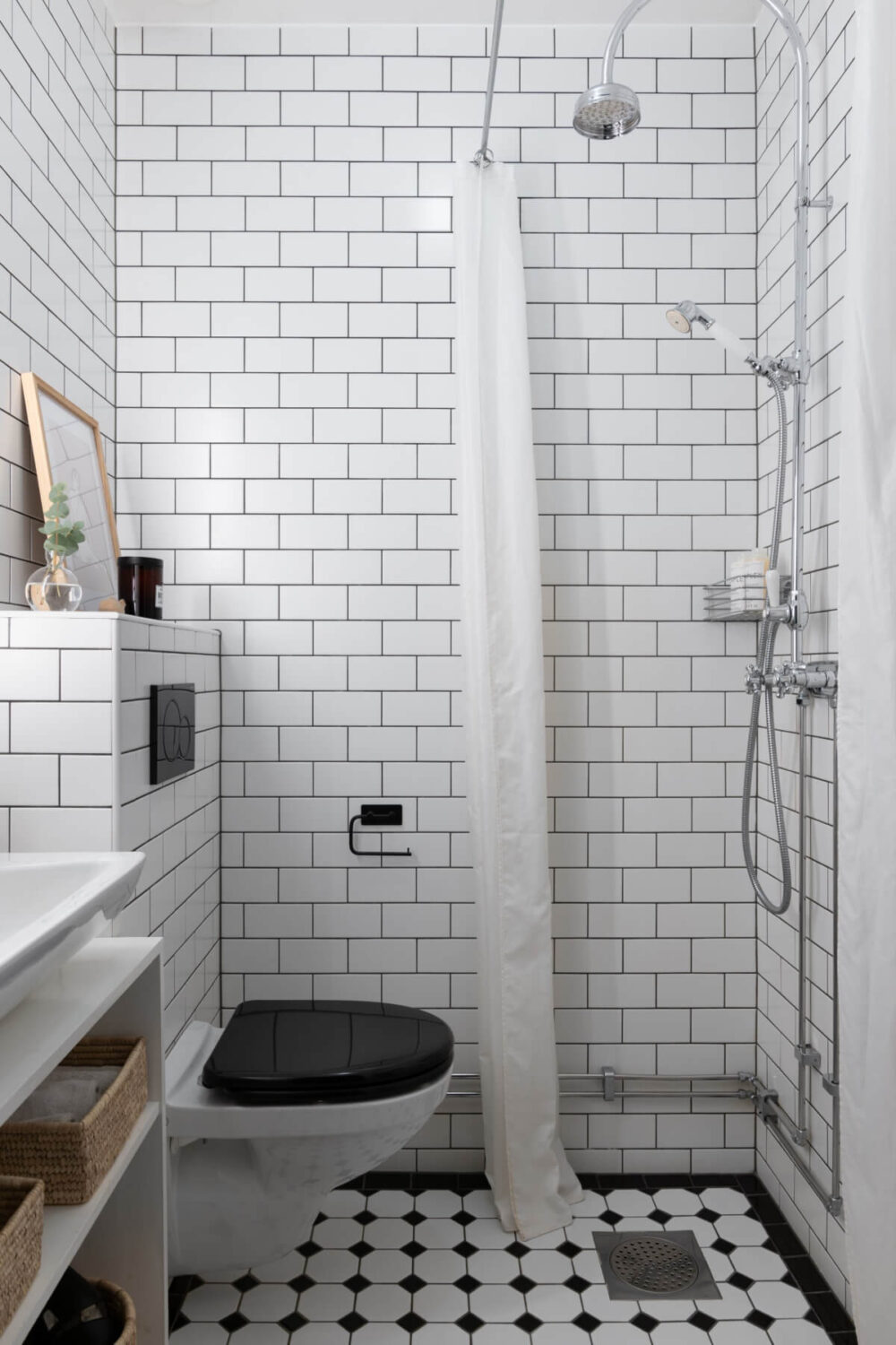 A Small Apartment Decorated in a Light Gray & White Color Palette 20 bathroom white subway tiles victorian style floor tiles nordroom