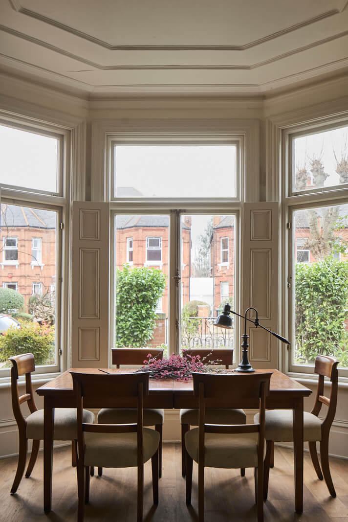 Grand Proportions and Period Details in a Victorian Villa 3 bay window with dining table