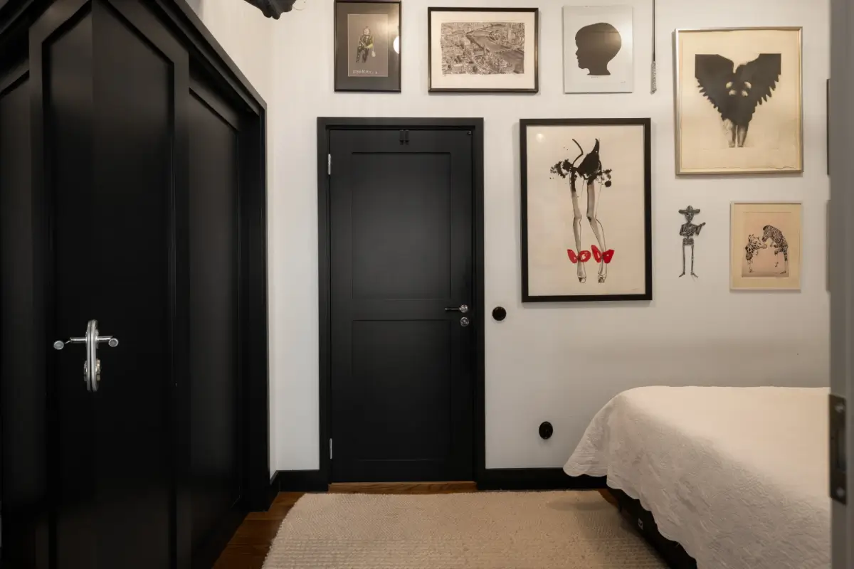 An Apartment with a Mirror Wall in a Former Stockholm Factory 18 bedroom black joinery