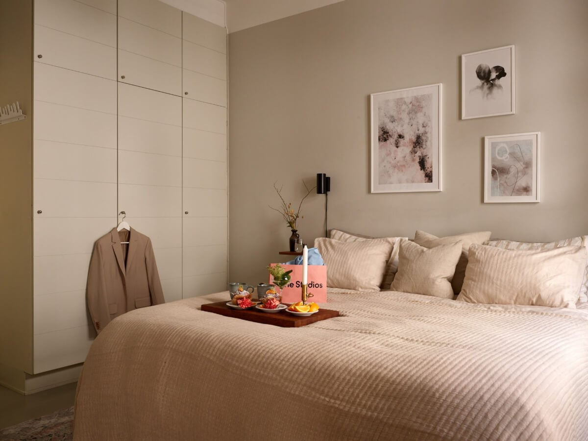 A Calm Gray Color Palette in a Charming Stockholm Apartment 9 bedroom built-in wardrobes