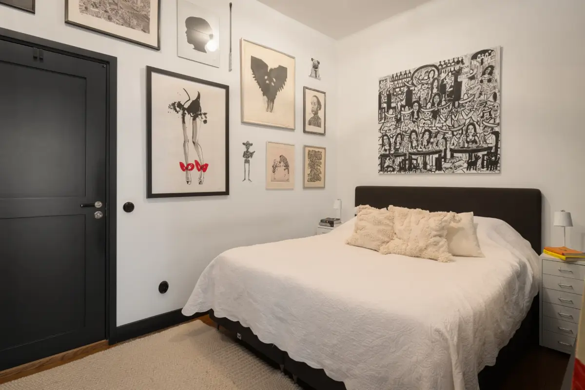 An Apartment with a Mirror Wall in a Former Stockholm Factory 17 bedroom dark gray woodwork