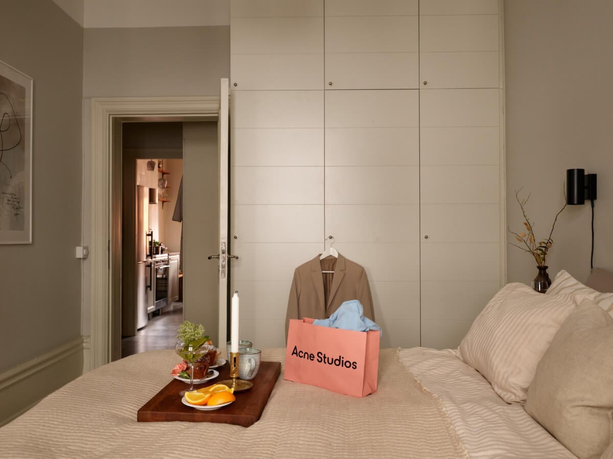 A Calm Gray Color Palette in a Charming Stockholm Apartment 10 bedroom floor to ceiling wardrobes