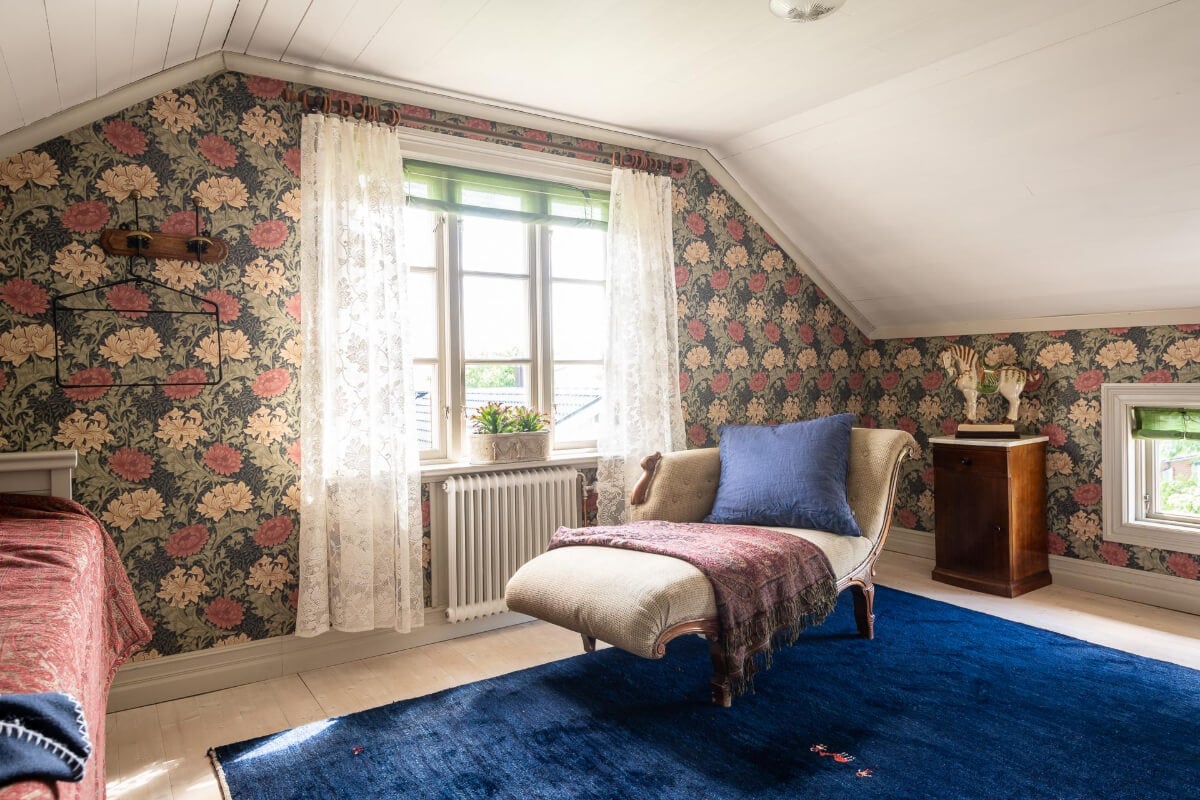 A Beautiful Historic Swedish Country House with Wallpapers 32 bedroom floral wallpaper blue rug