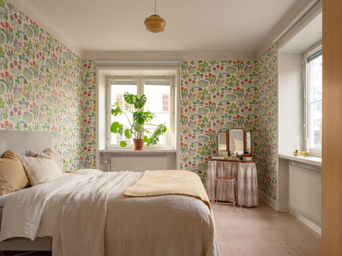 A Light Corner Apartment with a Pale Yellow Kitchen 16 bedroom floral wallpaper