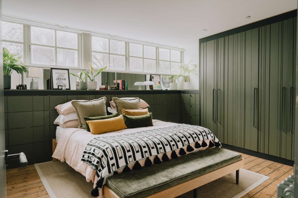 A London Basement Apartment in a Former Wood Workshop 16 bedroom high windows green wardrobes