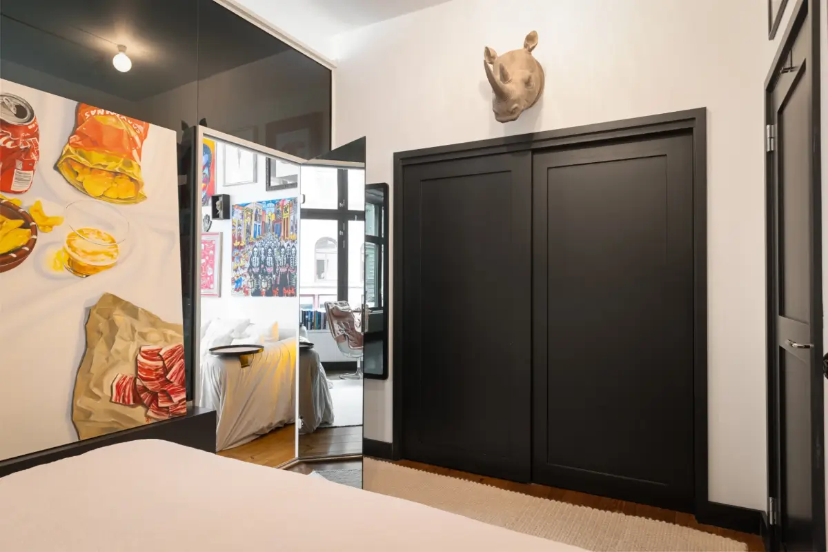 An Apartment with a Mirror Wall in a Former Stockholm Factory 20 bedroom mirror door