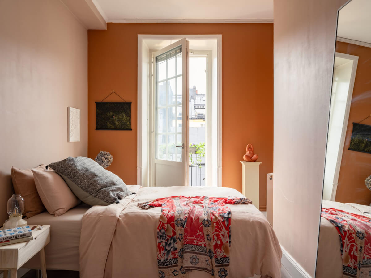 A Pink and Orange Bedroom in a Light Stockholm Apartment 15 bedroom pink and orange walls