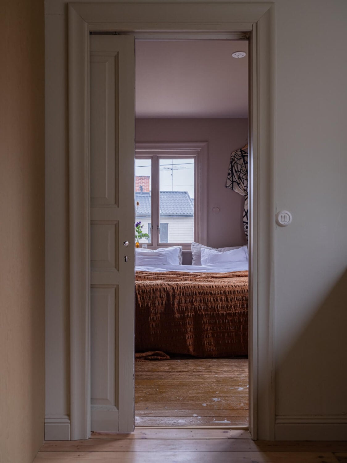 A 1920s Villa Pairs Modern Design and Period Features 11 bedroom with sliding wooden door