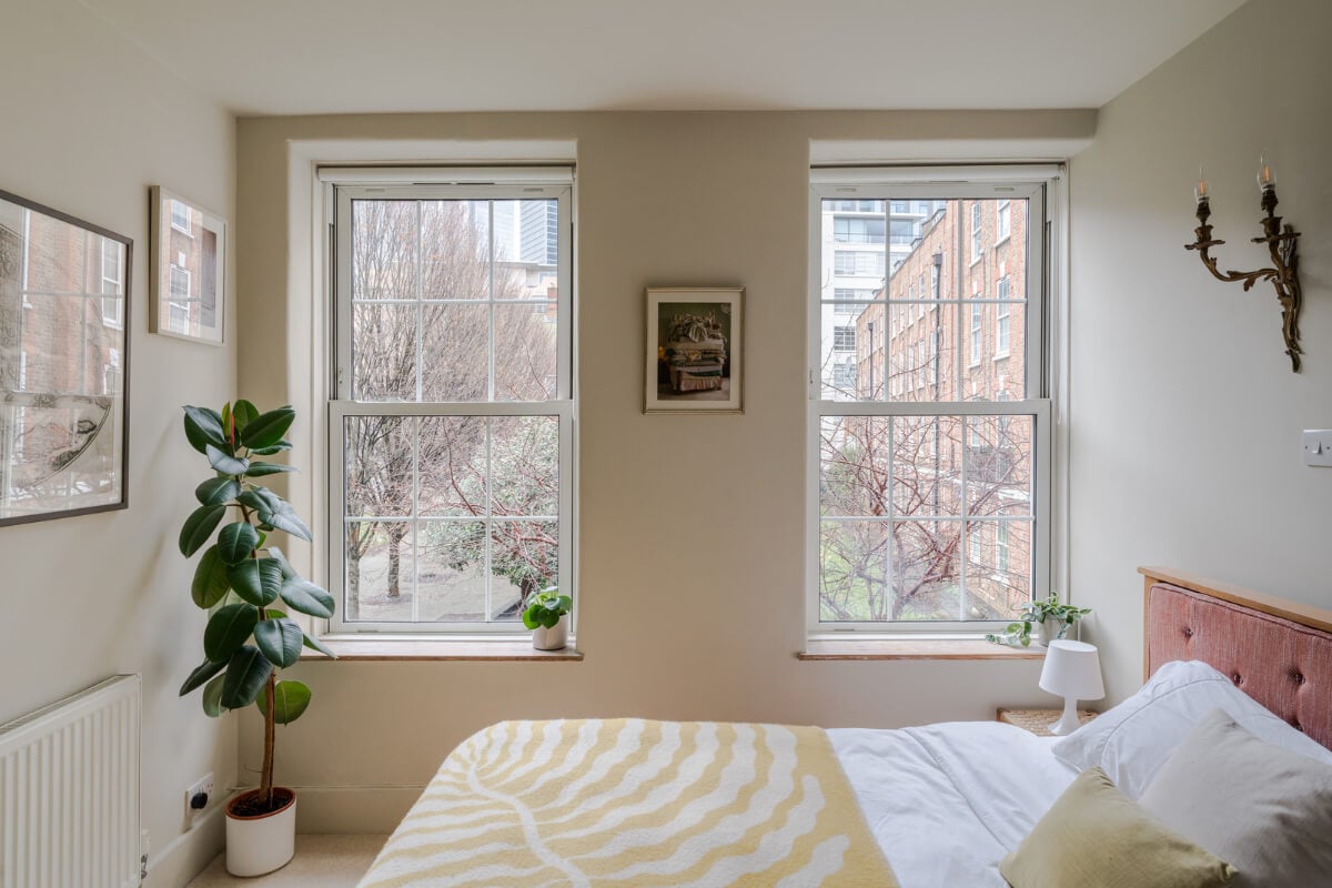 A Calm & Stylish Color Palette in a Small London Apartment 11 beige bedroom sash windows