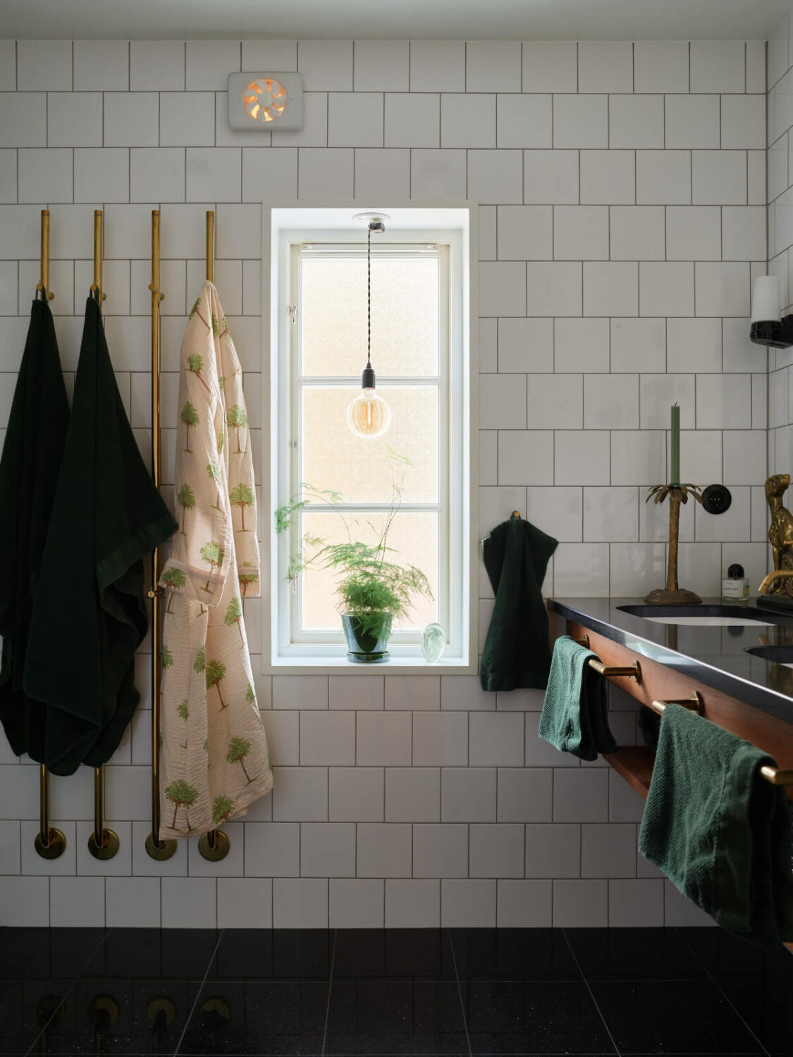 Colorful Interiors in a Wonderful Early 20th Century Swedish Villa 26 black and white bathroom